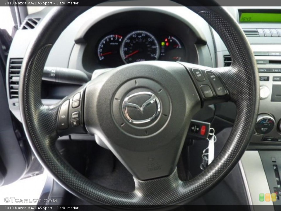 Black Interior Steering Wheel for the 2010 Mazda MAZDA5 Sport #44098384