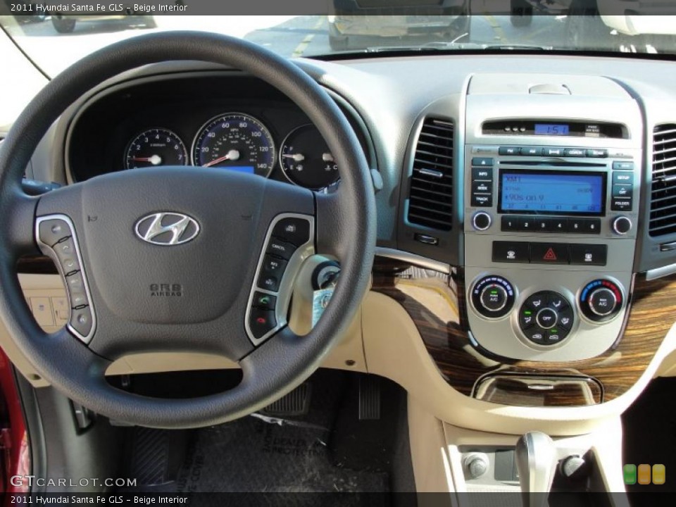 Beige Interior Dashboard for the 2011 Hyundai Santa Fe GLS #44099708