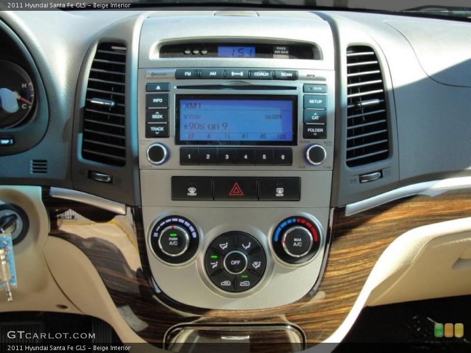 Beige Interior Controls for the 2011 Hyundai Santa Fe GLS #44099728