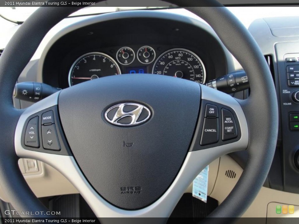 Beige Interior Steering Wheel for the 2011 Hyundai Elantra Touring GLS #44108682