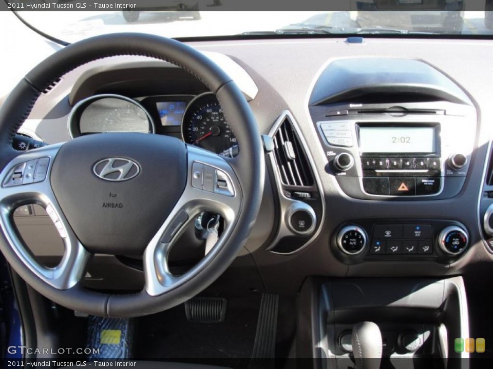 Taupe Interior Dashboard for the 2011 Hyundai Tucson GLS #44110466