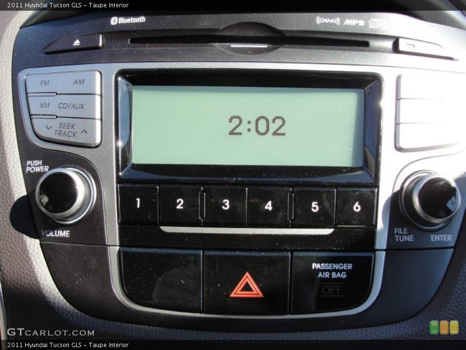 Taupe Interior Controls for the 2011 Hyundai Tucson GLS #44110498