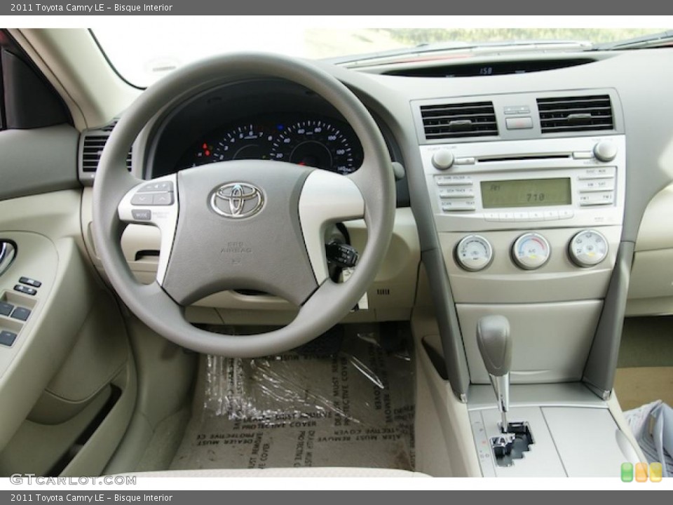 Bisque Interior Dashboard for the 2011 Toyota Camry LE #44110946