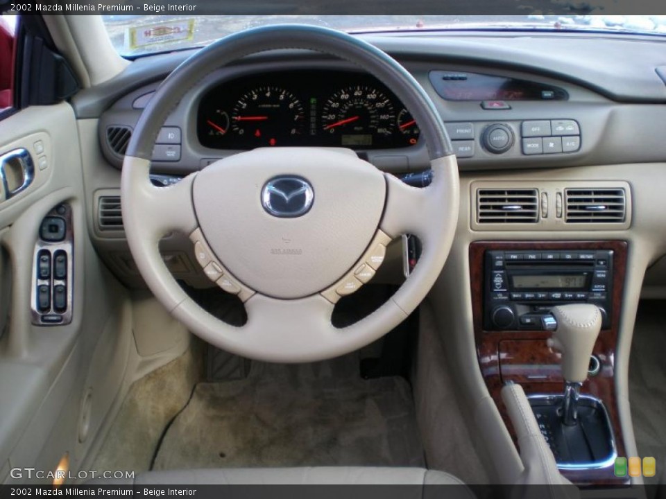 Beige Interior Dashboard for the 2002 Mazda Millenia Premium #44124026