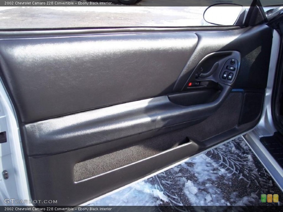 Ebony Black Interior Door Panel for the 2002 Chevrolet Camaro Z28 Convertible #44125654