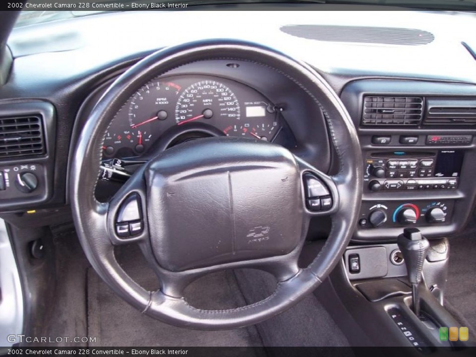 Ebony Black Interior Dashboard for the 2002 Chevrolet Camaro Z28 Convertible #44125702