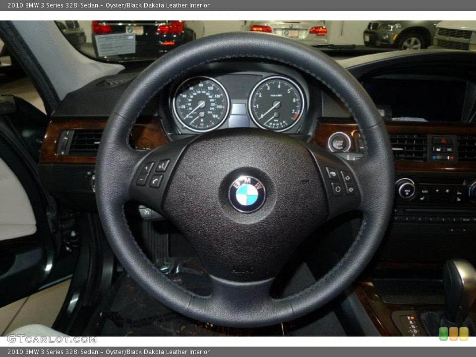 Oyster/Black Dakota Leather Interior Steering Wheel for the 2010 BMW 3 Series 328i Sedan #44161604