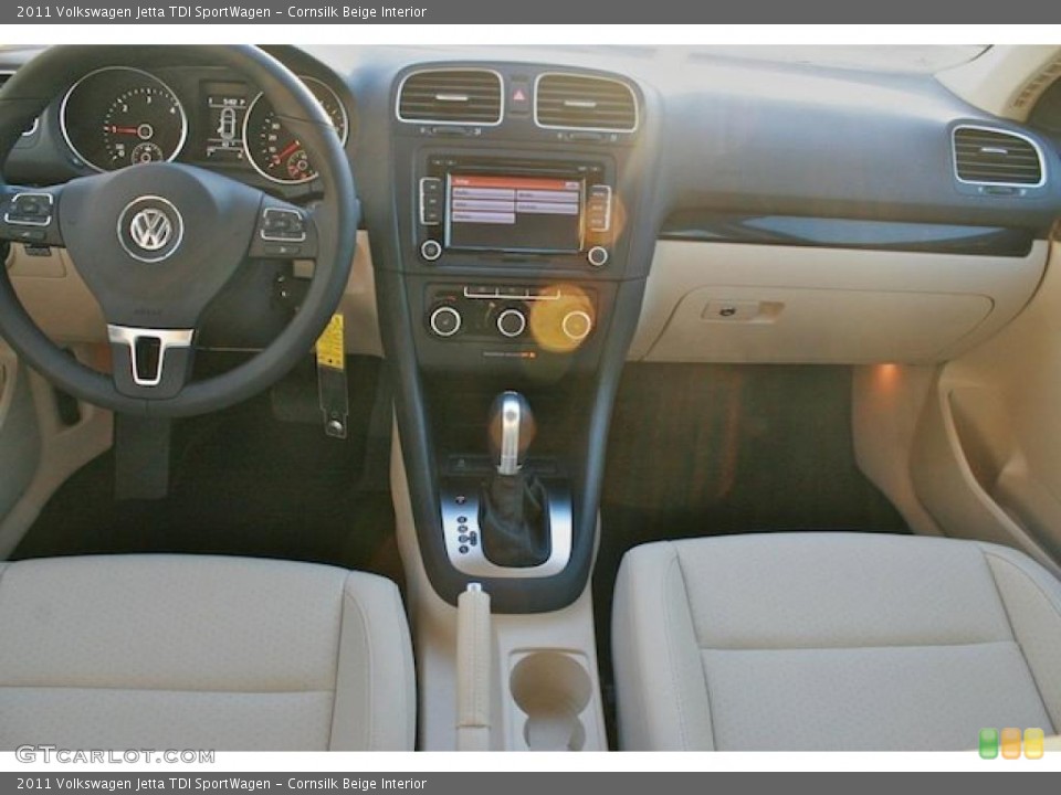 Cornsilk Beige Interior Dashboard for the 2011 Volkswagen Jetta TDI SportWagen #44192312