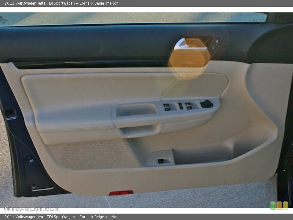 Cornsilk Beige Interior Door Panel for the 2011 Volkswagen Jetta TDI SportWagen #44192381