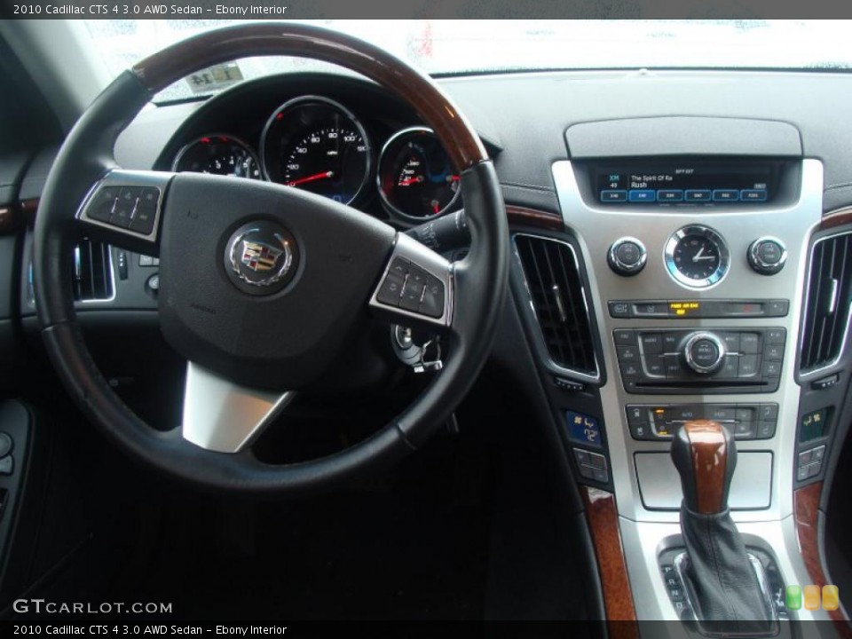 Ebony Interior Dashboard for the 2010 Cadillac CTS 4 3.0 AWD Sedan #44219017