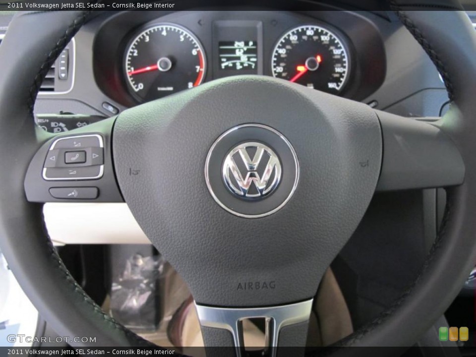 Cornsilk Beige Interior Steering Wheel for the 2011 Volkswagen Jetta SEL Sedan #44220825