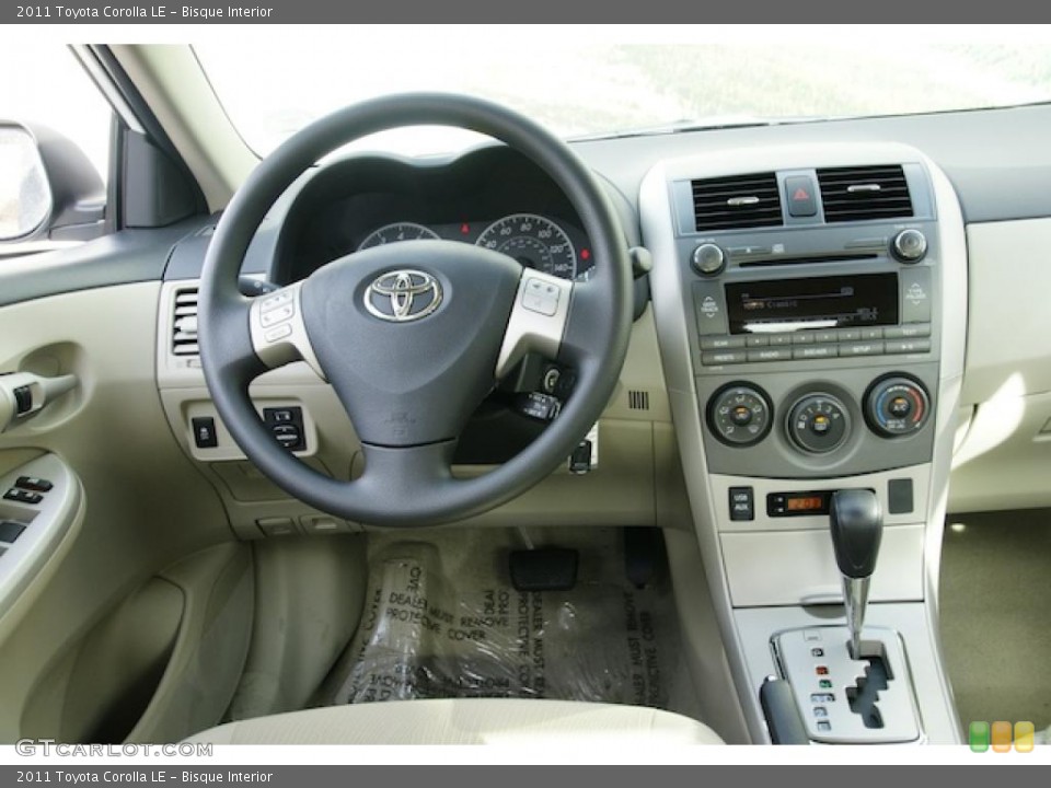 Bisque Interior Dashboard for the 2011 Toyota Corolla LE #44221858