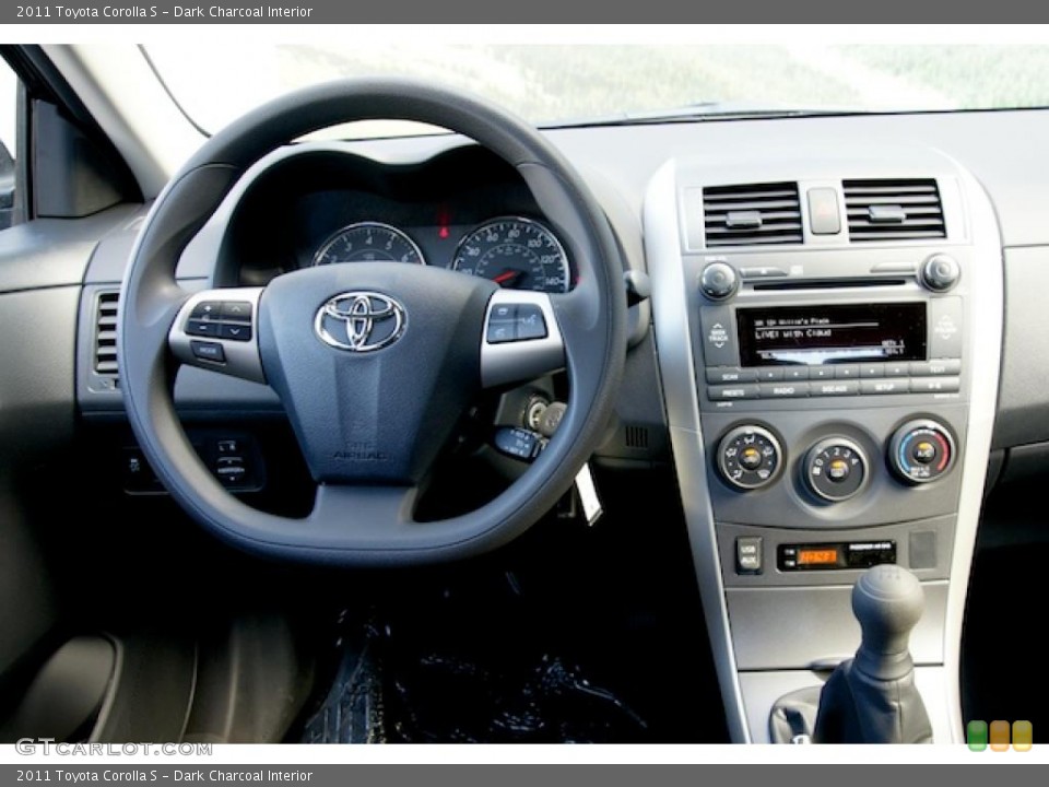 Dark Charcoal Interior Dashboard for the 2011 Toyota Corolla S #44221993