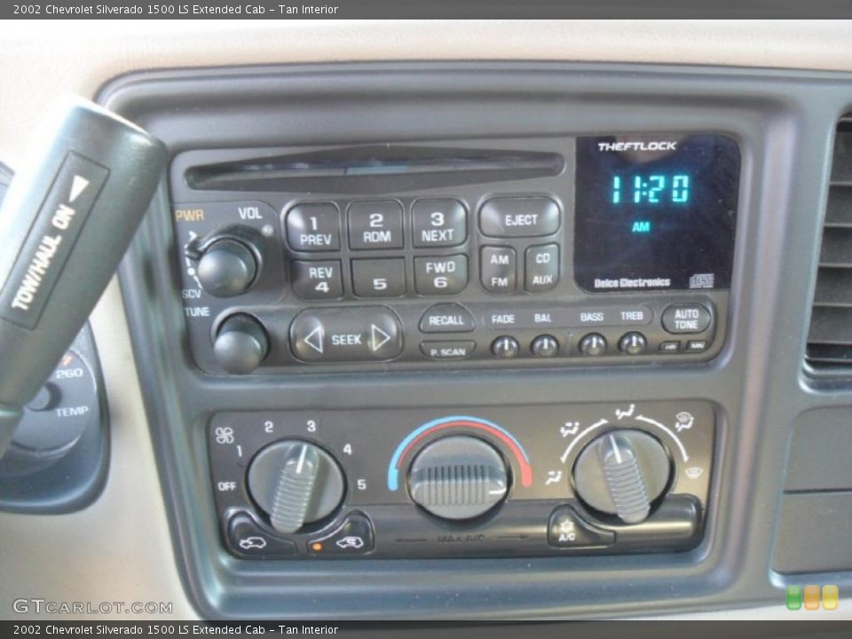 Tan Interior Controls for the 2002 Chevrolet Silverado 1500 LS Extended Cab #44250744