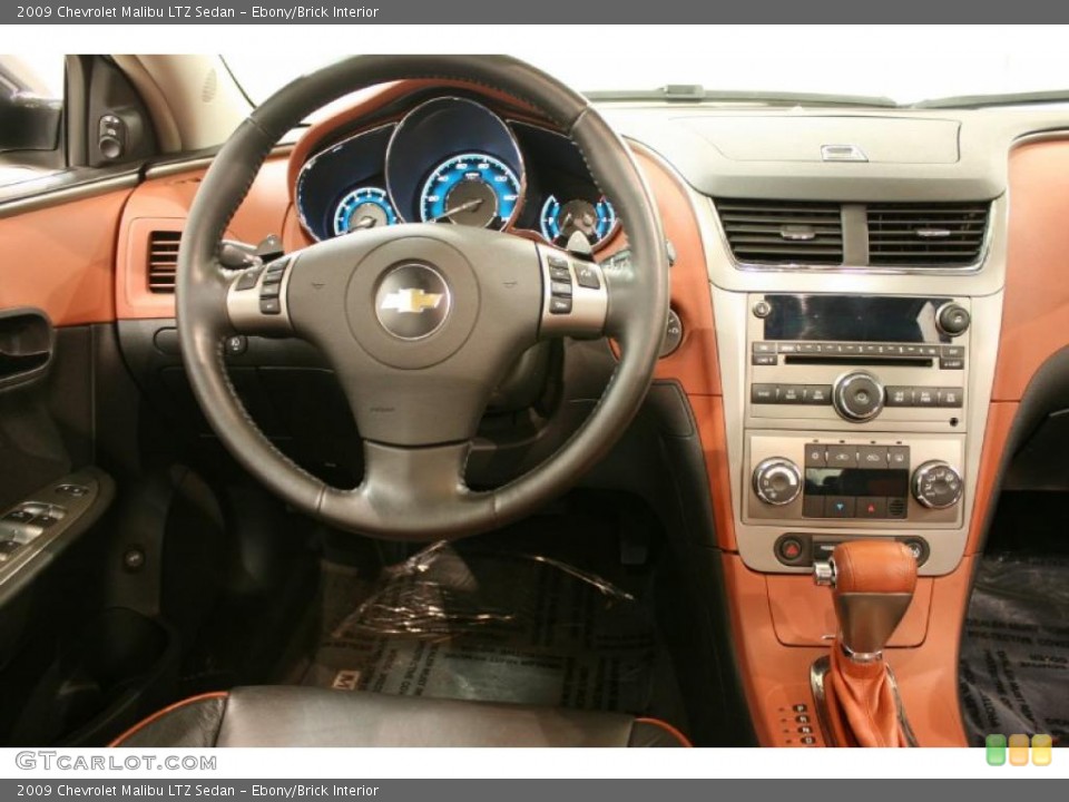 Ebony/Brick Interior Dashboard for the 2009 Chevrolet Malibu LTZ Sedan #44320045