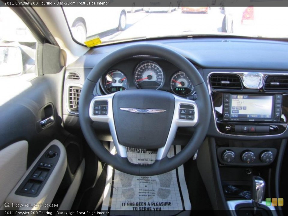 Black/Light Frost Beige Interior Dashboard for the 2011 Chrysler 200 Touring #44354542