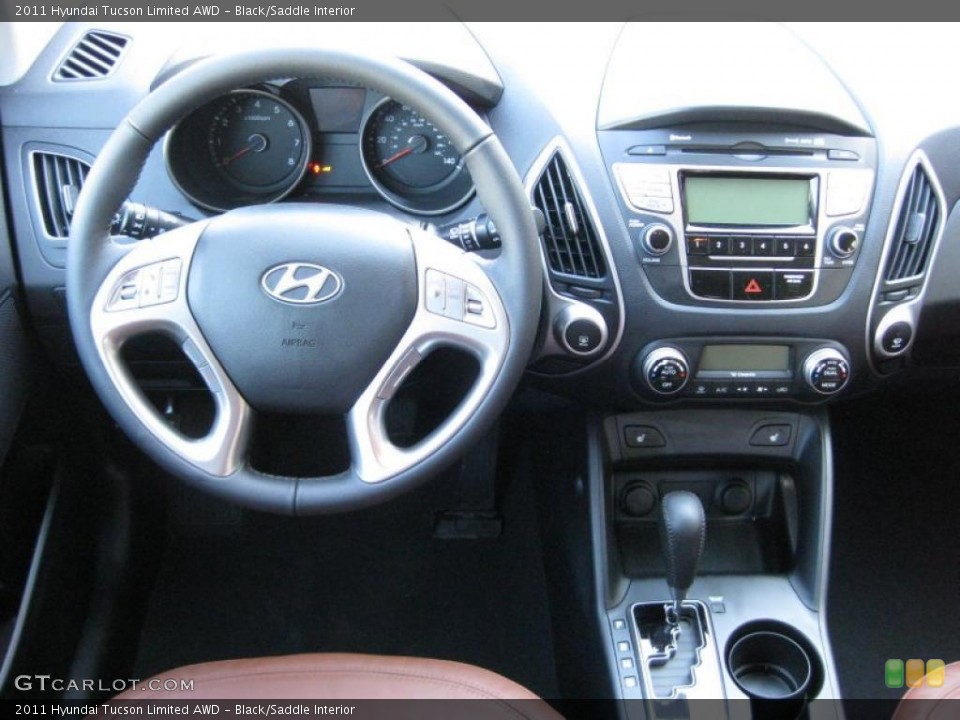 Black/Saddle Interior Dashboard for the 2011 Hyundai Tucson Limited AWD #44439170