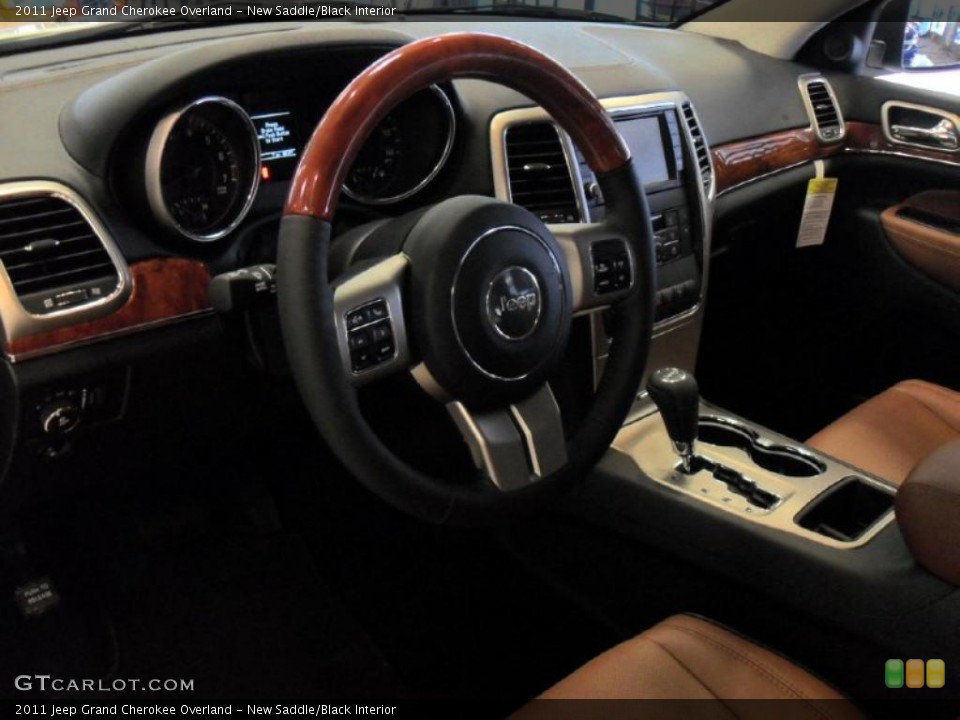 New Saddle/Black Interior Prime Interior for the 2011 Jeep Grand Cherokee Overland #44570433