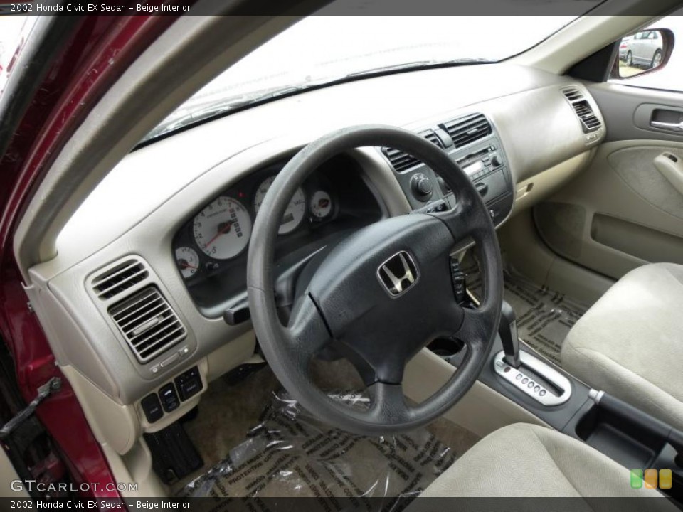 Beige Interior Prime Interior for the 2002 Honda Civic EX Sedan #44592272