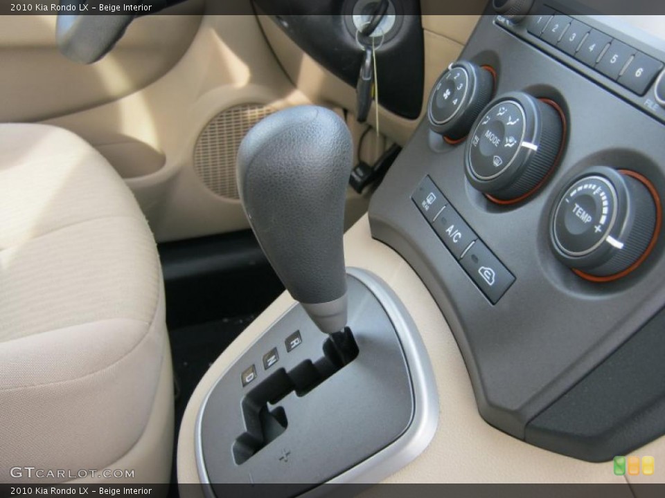 Beige Interior Transmission for the 2010 Kia Rondo LX #44602192
