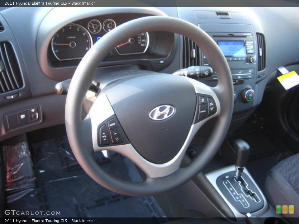 Black Interior Steering Wheel for the 2011 Hyundai Elantra Touring GLS #44612186