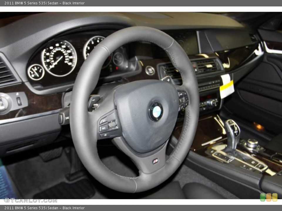 Black Interior Steering Wheel for the 2011 BMW 5 Series 535i Sedan #44638022