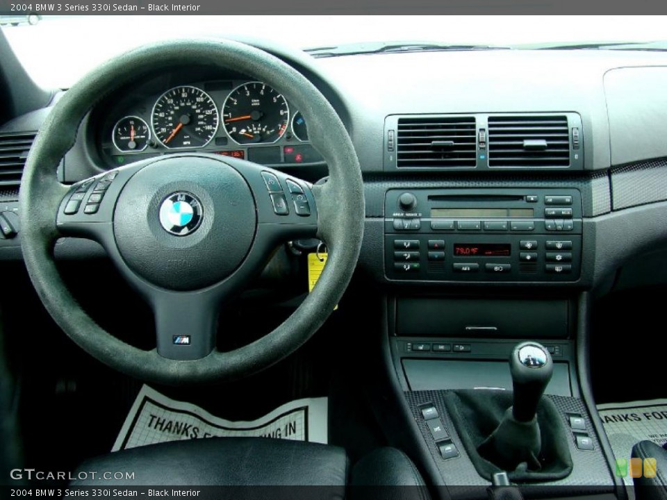 Black Interior Dashboard for the 2004 BMW 3 Series 330i Sedan #44657296