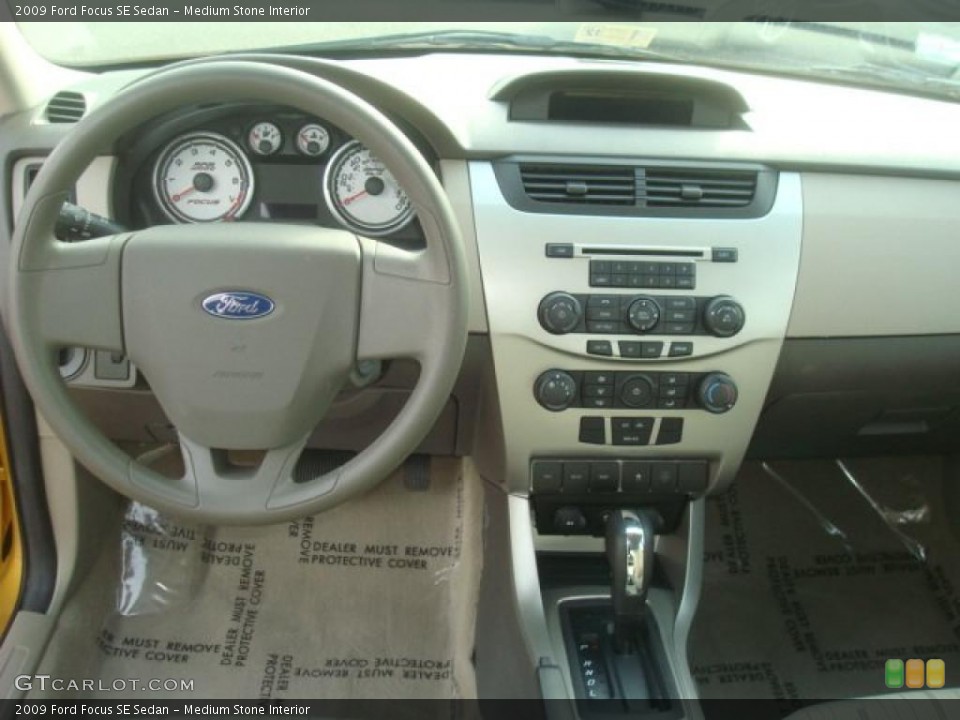 Medium Stone Interior Dashboard for the 2009 Ford Focus SE Sedan #44660443