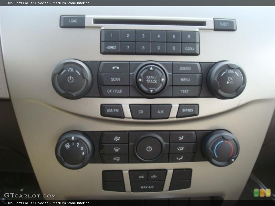 Medium Stone Interior Controls for the 2009 Ford Focus SE Sedan #44660491