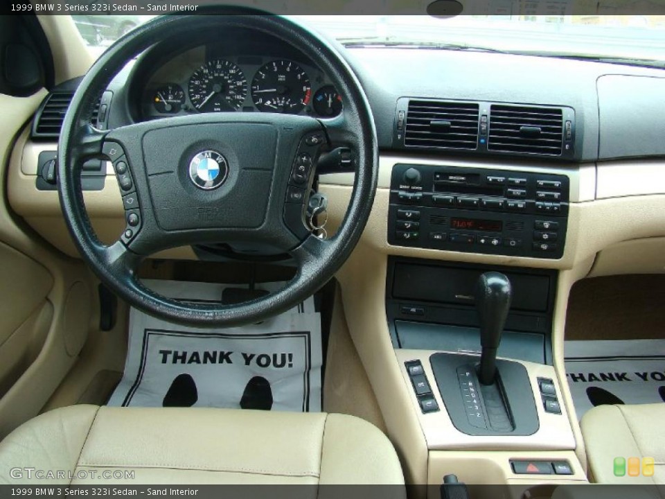 Sand Interior Dashboard for the 1999 BMW 3 Series 323i Sedan #44660811