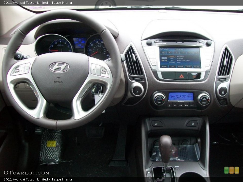 Taupe Interior Dashboard for the 2011 Hyundai Tucson Limited #44675907