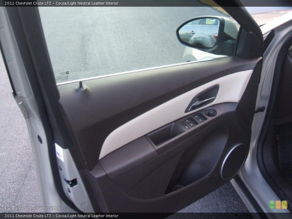 Cocoa/Light Neutral Leather Interior Door Panel for the 2011 Chevrolet Cruze LTZ #44679399