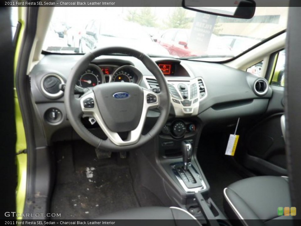 Charcoal Black Leather Interior Dashboard for the 2011 Ford Fiesta SEL Sedan #44688016