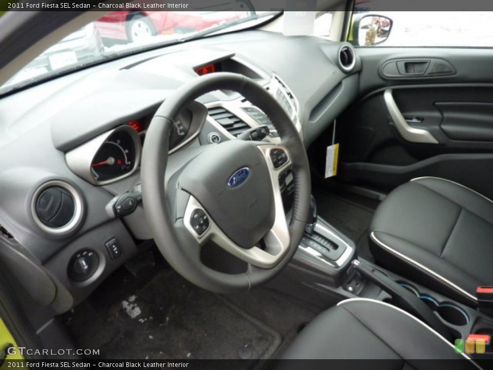 Charcoal Black Leather Interior Prime Interior for the 2011 Ford Fiesta SEL Sedan #44688052