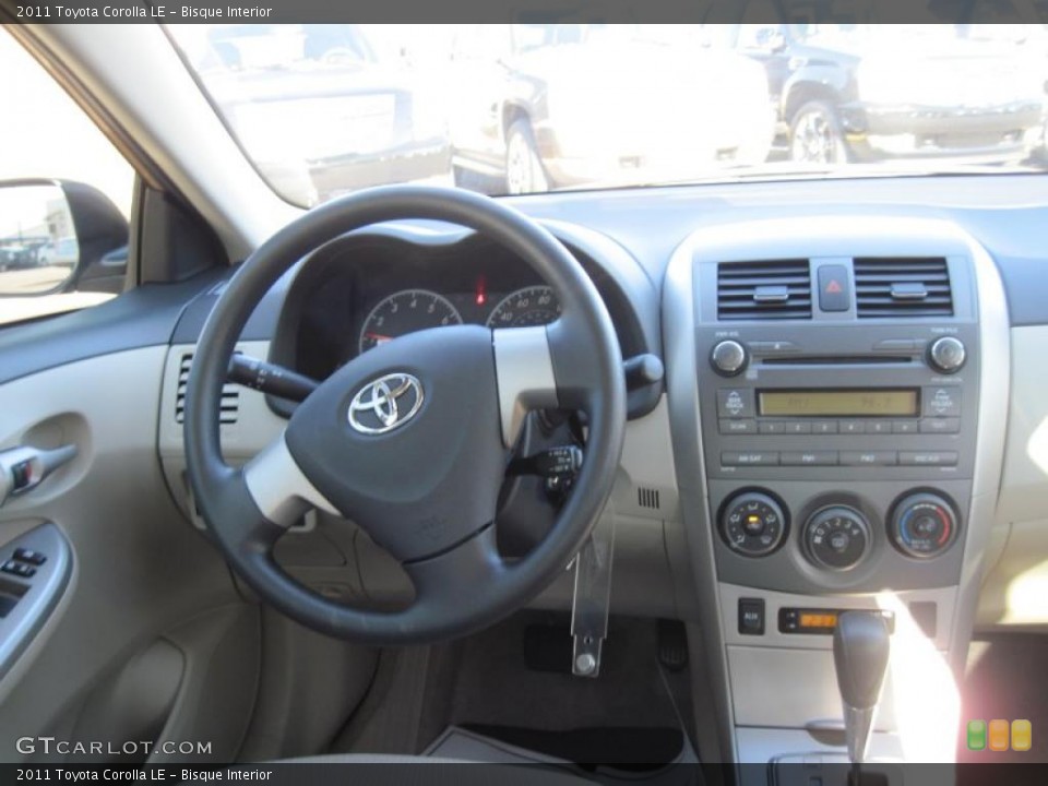 Bisque Interior Dashboard for the 2011 Toyota Corolla LE #44691417