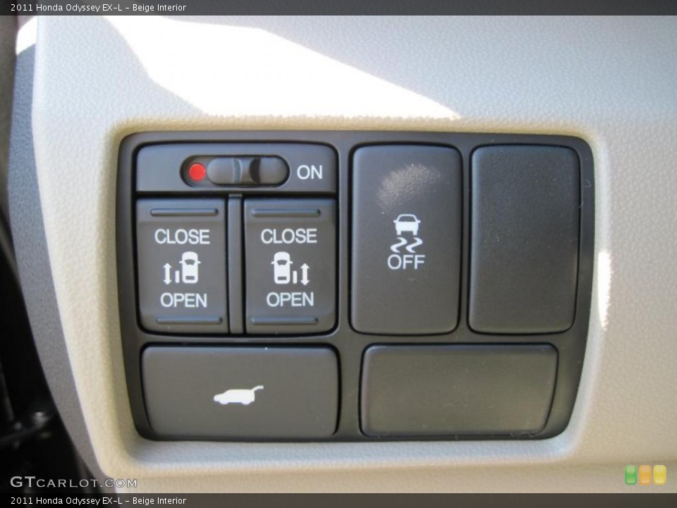 Beige Interior Controls for the 2011 Honda Odyssey EX-L #44694130