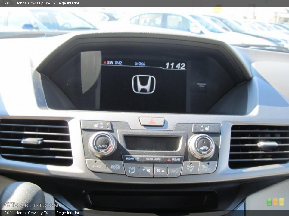 Beige Interior Controls for the 2011 Honda Odyssey EX-L #44694309