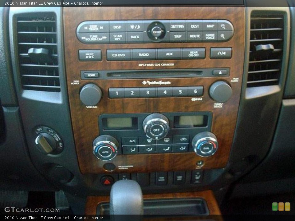 Charcoal Interior Controls for the 2010 Nissan Titan LE Crew Cab 4x4 #44704458