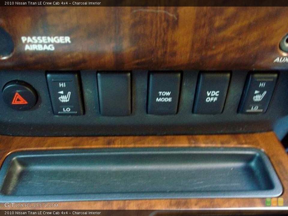 Charcoal Interior Controls for the 2010 Nissan Titan LE Crew Cab 4x4 #44704662