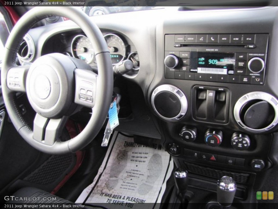 Black Interior Dashboard for the 2011 Jeep Wrangler Sahara 4x4 #44710321