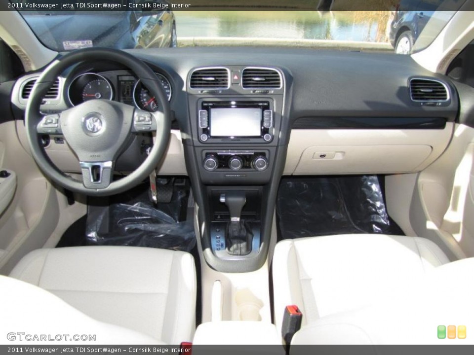 Cornsilk Beige Interior Dashboard for the 2011 Volkswagen Jetta TDI SportWagen #44716539