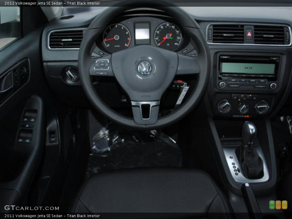 Titan Black Interior Dashboard for the 2011 Volkswagen Jetta SE Sedan #44719016