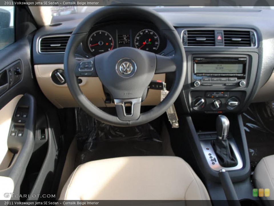 Cornsilk Beige Interior Dashboard for the 2011 Volkswagen Jetta SE Sedan #44719204