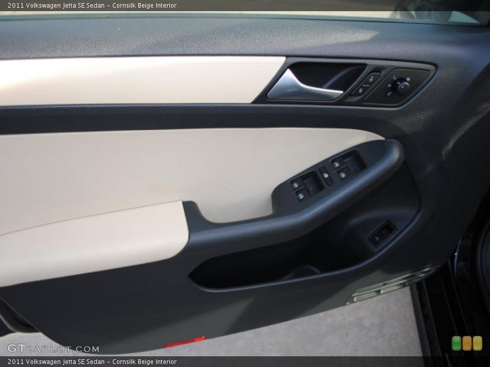 Cornsilk Beige Interior Door Panel for the 2011 Volkswagen Jetta SE Sedan #44719229