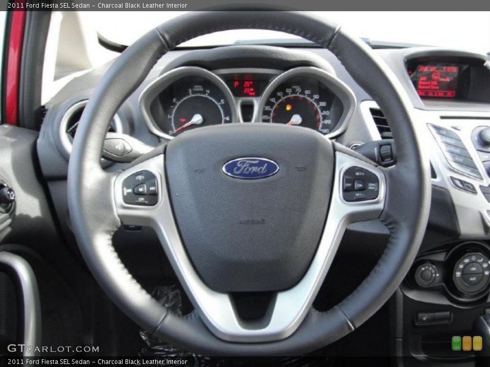 Charcoal Black Leather Interior Steering Wheel for the 2011 Ford Fiesta SEL Sedan #44722032