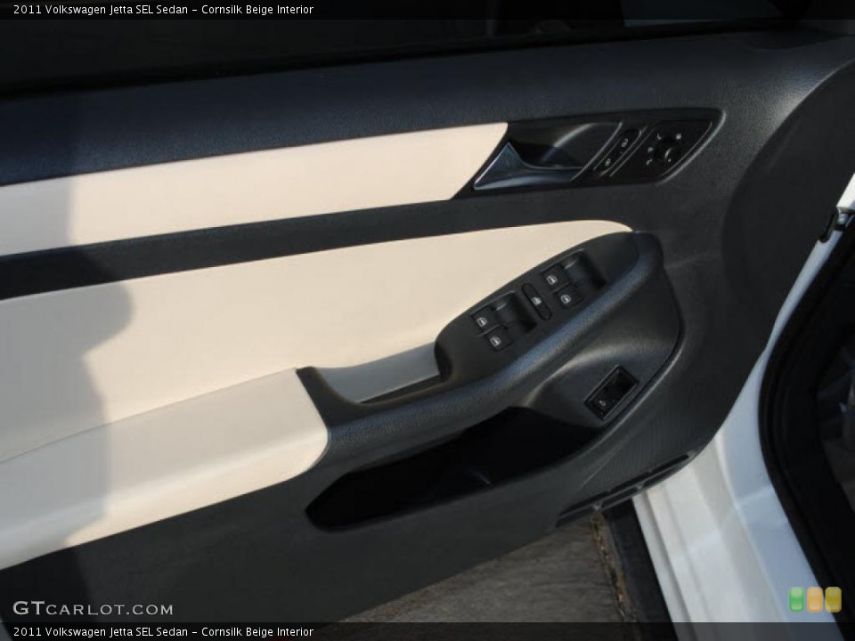 Cornsilk Beige Interior Door Panel for the 2011 Volkswagen Jetta SEL Sedan #44722596