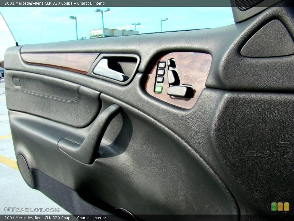 Charcoal Interior Door Panel for the 2001 Mercedes-Benz CLK 320 Coupe #44724796