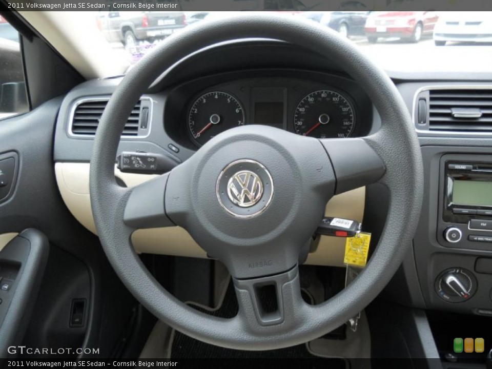 Cornsilk Beige Interior Steering Wheel for the 2011 Volkswagen Jetta SE Sedan #44727105