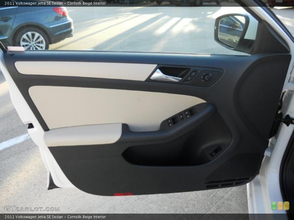 Cornsilk Beige Interior Door Panel for the 2011 Volkswagen Jetta SE Sedan #44727261
