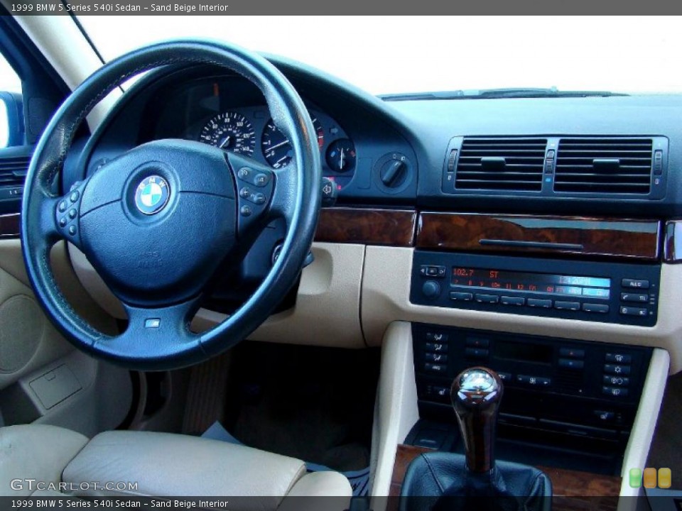 Sand Beige Interior Dashboard for the 1999 BMW 5 Series 540i Sedan #44731024